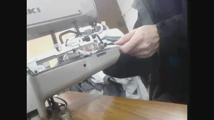 Placing and adjust the clamp for shank buttons of Juki - 373 button machine